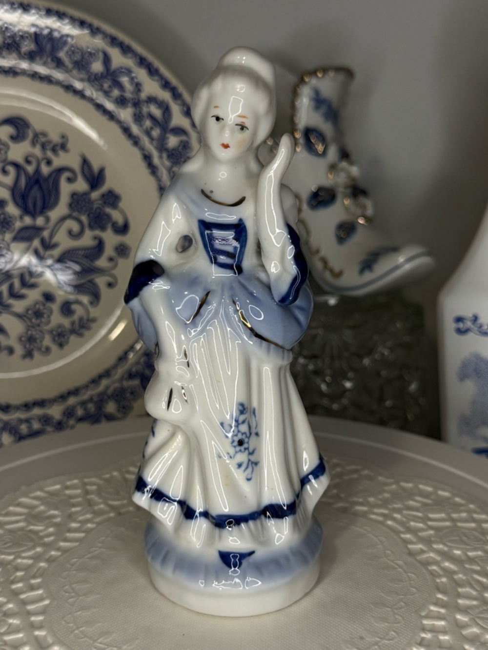 Vintage blue and white porcelain lady